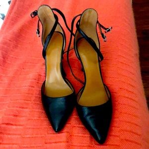 Wether wearing a dress or jeans, these Halston black heels upgrade any outfit.